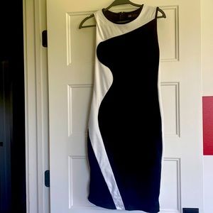 Black and white body con, zips up the back, very flattering